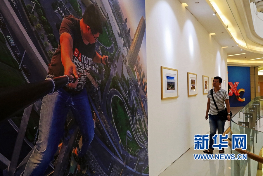 鄭州首個城市風光攝影展《鄭.城.長》開展 鄭州首個城市風光攝影展《鄭.城.長》開展